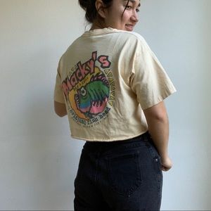 yellow graphic crop top with a neon decal